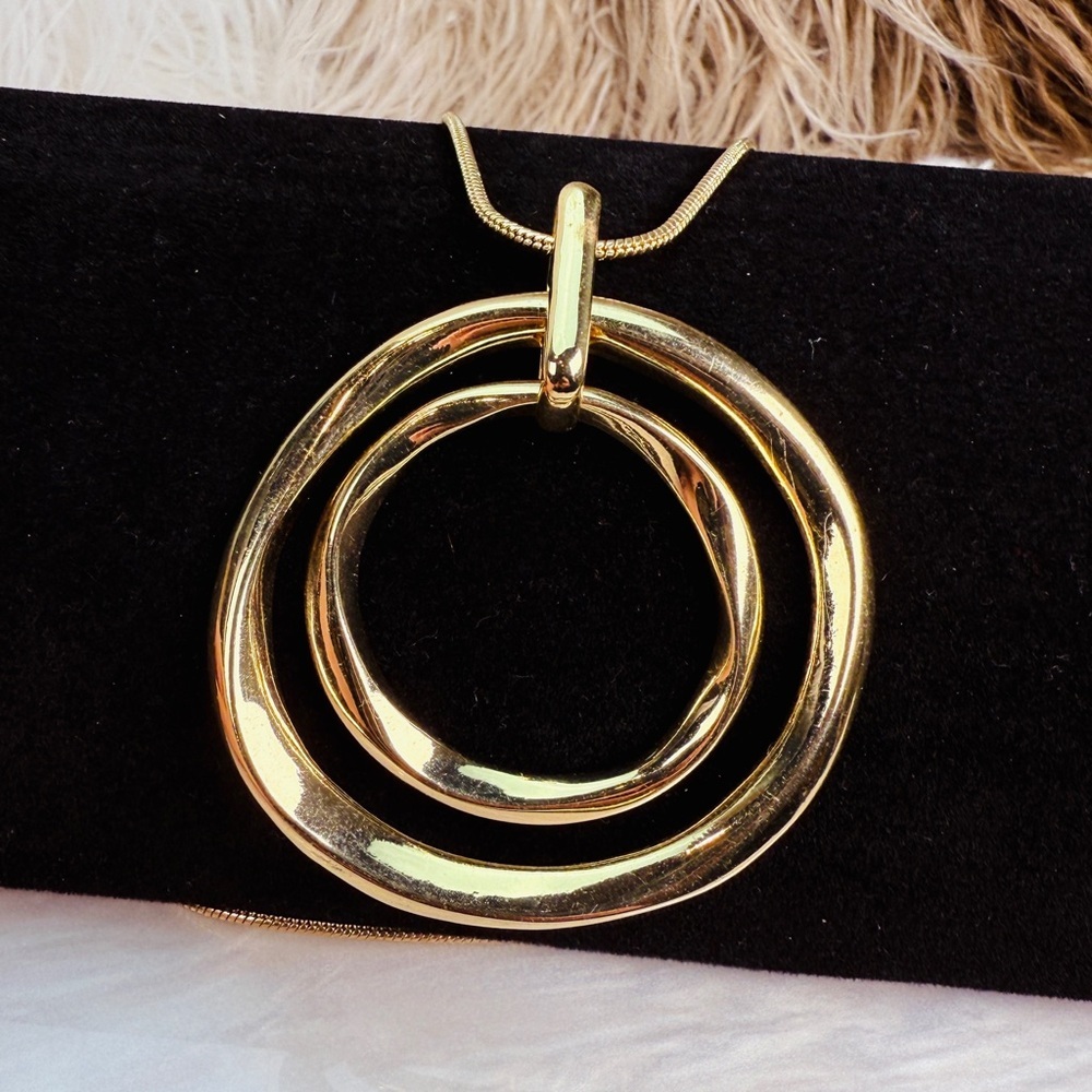 Vintage large goldtone circle pendant long chain necklace